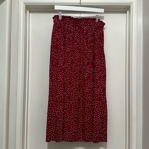 Burgundy polka dot midi skirt.